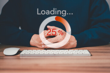 Poster - Man using a computer keyboard to download and waiting to loading digital business data form website, concept of waiting for load of loading bar.