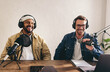 © Jacob Lund - Male radio presenters having a great time in a studio