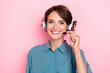 © deagreez - Photo portrait of adorable young woman call center touch microphone toothy smile dressed trendy blue look isolated on pink color background