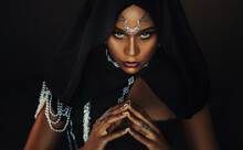 Portrait Fantasy African American Woman Dark Queen. Halloween Girl Voodoo Witch, Black Costume Dress. Gothic Goddess Lady Of Moon, Hood Silver Tiara Crown On Head. Sexy Mystical Face Look At Camera