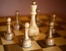 King Encircled By The Pawns. Chess Pieces.