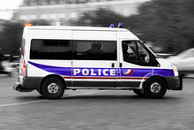 A Police Truck Drives On The Road Through The City. French National Police In Action. (2022)
