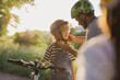© pikselstock - Shot of a father adjusting his son's helmet