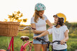 © pikselstock - Mother and son enjoying a bike trip together