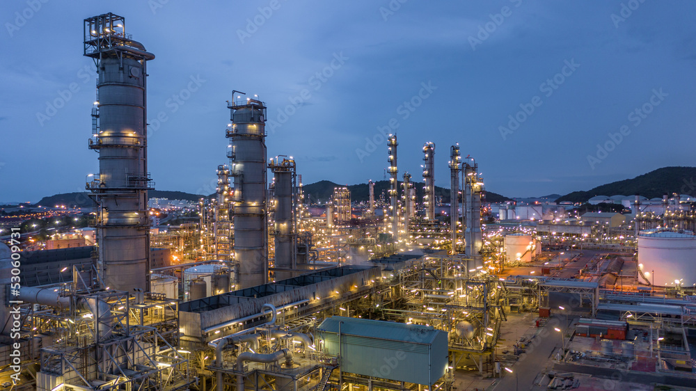 Oil and gas refinery plant form industry zone at night, Aerial view oil ...