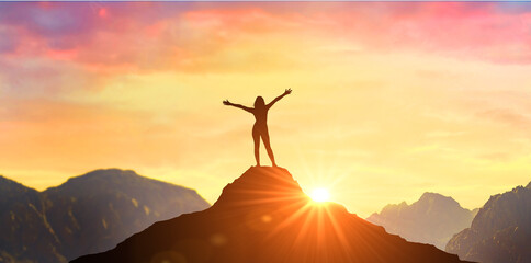 Wall Mural - Successful woman has achieving new peak of personal growth and development. Woman on mountain peak with open arms welcoming new day with sunrise. Success Business Leadership, Winner on top