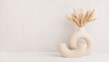 Fototapeta Boho - Wheat ears in a stylish modern vase, Scandinavian interior decoration concept, banner, copy space