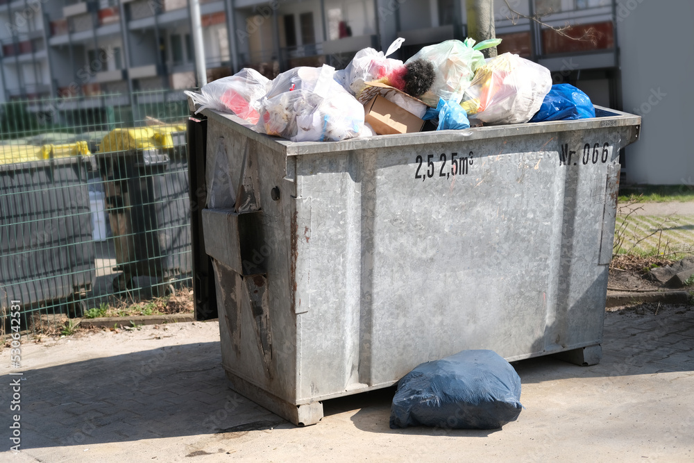 Garbage Contained large metal garbage container, trash can, garbage collection in ...