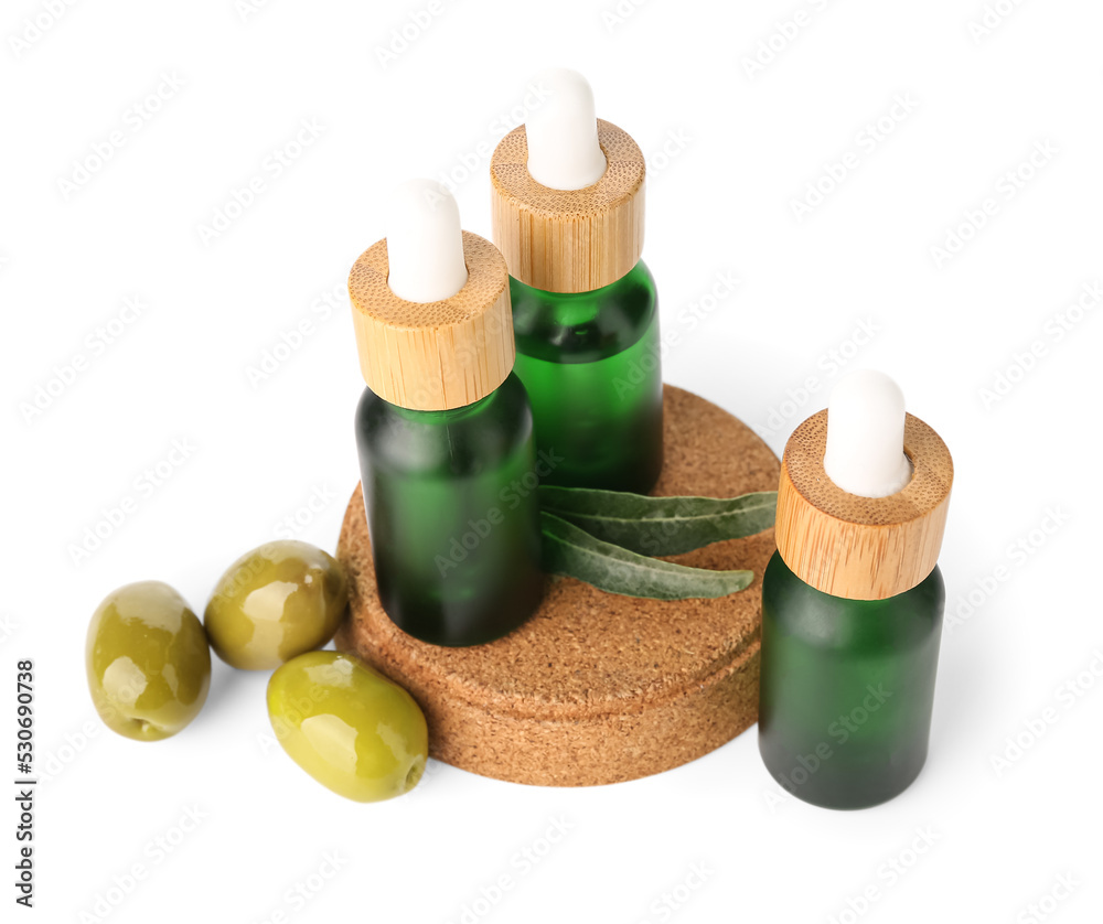Bottles of essential olive oil isolated on white background