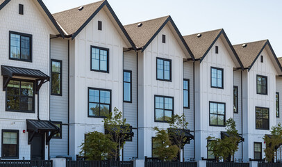 Brand new apartment building on sunny day in BC, Canada. Architectural details of modern apartment building