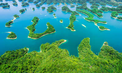 Aerial view of beautiful Thousand Island Lake natural scenery in summer, Hangzhou, Zhejiang Province, China. Clean lake water and green mountain nature landscape.