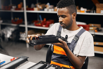 Wall Mural - factory worker doing quality control at the production line