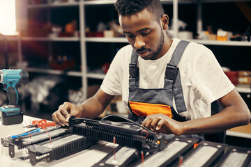 Wall Mural - factory worker doing quality control at the production line