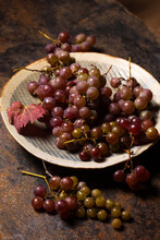 Ripe Grapes In A Plate On A Metal Background