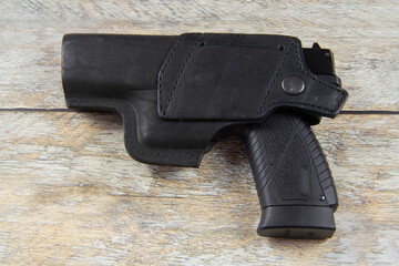 Black pistol holster. Holster for a short gun