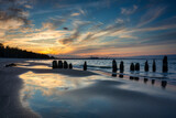 Fototapeta Bambus - Sunset on the beach of the Baltic Sea in Gdansk, Poland