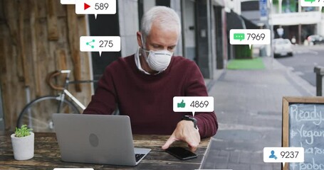 Poster - Animation of media icons over senior caucasian man with laptop