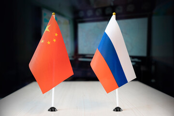 Wall Mural - flags of russia and china international negotiations. conclusion of contracts between countries. concept of communication between representatives of two countries. Geopolitica