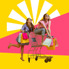 Creative poster, flyer with two happy girls with shopping bags ride on shop cart isolated on colorful abstract background. Black Friday, discount, emotions