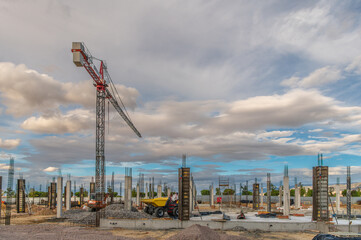 Wall Mural - Formwork and crane on a construction site of a building