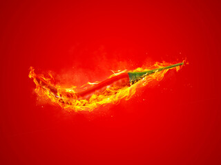 Wall Mural - fresh red chilli, on fire on red background