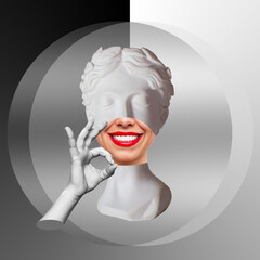 Wall Mural - Antique smiling female statue's head with red lips shows the ok gesture with hand on black and white background. 3d trendy abstact collage in magazine surreal style. Contemporary art. Modern design