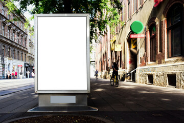 blank digital ad panel. billboard display. empty white lightbox sign at busstop. mockup template. city transit station. urban street setting. outdoor advertising.