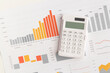 © LunaKate - Business graphs, charts and calculator on table. Financial development, Banking Account, Statistics