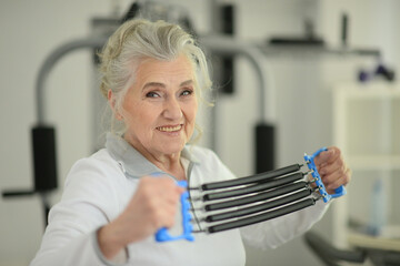 Canvas Print - Portrait of an elderly woman in gym