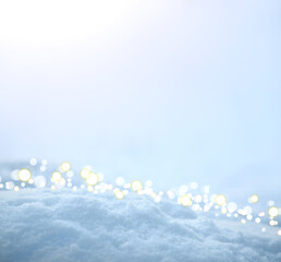 Wall Mural - Fresh snow texture background in blue tone and sunlight.