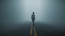 Woman Walking Alone Down Foggy Road In Forest