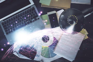 Poster - Social network hologram drawings over computer on the desktop background. Top view. Double exposure.