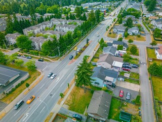 Beautiful view of traffic roads and houses with trees in a town