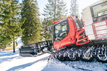Red Modern Snowcat Ratrack With Snowplow,snow Grooming Machine,remover Truck Preparing Ski Slope,piste,hill At Alpine Skiing Winter Resort. Heavy Machinery,tractor Mountain Equipment Track Vehicle