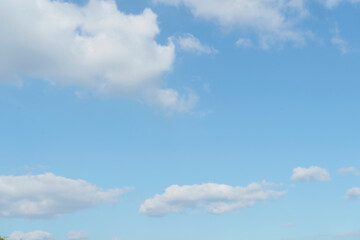 Wall Mural - Beautiful clouds during spring time in a Sunny day. Blue sky and white fluffy clouds