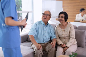 Caregiving nurse working in elder home care service showing health condition report to senior retirement ege person and call for meeting to brieft consult to senior personnel how to maintain healthy
