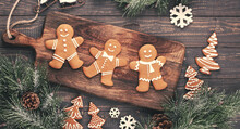 Homemade Christmas Gingerbread Cookies On Wooden Table.