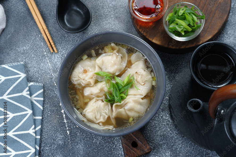 delicious of wonton soup with chili oil and green onion,chinese food,asian food style 