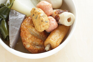 Wall Mural - Homemade Japanese winer comfort food, oden fish cake and radish simmered 