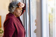 © Wavebreak Media - Thoughtful senior african american women looking out the sunny window