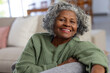 © Wavebreak Media - Portrait of happy senior african american women in the sunny living room