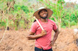 © Confidence - portrait of an african farmer smiling