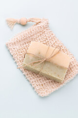 Poster - Handmade natural soap on pastel background.