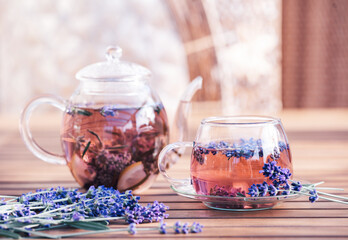 Poster - Glass cup of lavender tea.