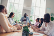 © deagreez - Photo of cheerful funny businesspeople listening conference coach indoors workstation workshop restroom