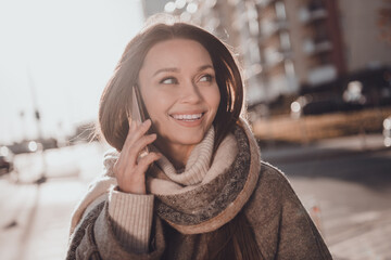 Sticker - Photo of cute sweet lady dressed warm coat scarf typing talking modern device enjoying sunny weather outdoors urban town road