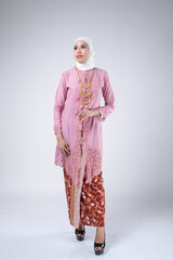 portrait of a beautiful female model wearing hijab, a lifestyle apparel for muslim women isolated on