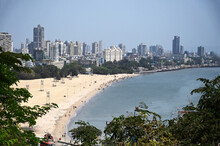 Looking Down On Mumbai Beachfront With The Highrise Modern City Beyond, From Malabar Hill, Mumbai, India