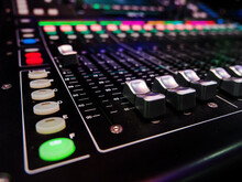 Concept Idea: Professional Broadcast Audio Mixer In Studio As Background