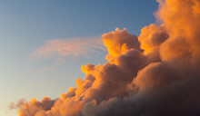 Cumulus And Stratus Clouds In Dramatic Sunset Sky
